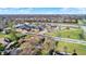 Aerial view of neighborhood including school and playground at 11 Bennett Rd, Carmel, IN 46032