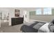 Bright bedroom with dresser and calming decor at 1867 Vista Ridge Dr, Greenwood, IN 46143