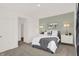 Simple bedroom with gray bed and green accent wall at 1867 Vista Ridge Dr, Greenwood, IN 46143
