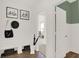 Inviting entryway with built-in bench, storage, and coat hooks at 1867 Vista Ridge Dr, Greenwood, IN 46143
