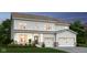 Two-story house with light gray siding, brick accents, and a two-car garage at 1867 Vista Ridge Dr, Greenwood, IN 46143