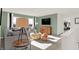 Spacious loft area with comfortable seating and a large TV at 1867 Vista Ridge Dr, Greenwood, IN 46143