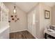 Welcoming entryway with wood-look flooring and a bright front door at 20420 Country Lake Blvd, Noblesville, IN 46062