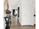 Bright foyer with luxury vinyl plank flooring and console table at 2783 Linwood Ave, Greenwood, IN 46143