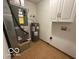 Utility room with water heater and HVAC unit at 2907 Braxton Ct, Indianapolis, IN 46229