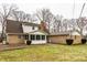 Rear view of house with brick and siding at 4205 Cranbrook Dr, Indianapolis, IN 46250