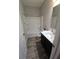 Updated bathroom featuring a shower/tub combo and dark vanity at 4411 Ringstead Way, Indianapolis, IN 46235