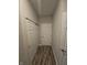 Hallway with double doors and closets at 4411 Ringstead Way, Indianapolis, IN 46235