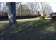 Front yard with mature trees and green grass at 5155 Turkey Track Rd, Martinsville, IN 46151