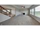 Living room featuring a fireplace and hardwood floors at 6060 W Brickell Ln, McCordsville, IN 46055