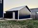 Metal storage shed with single door, offering extra storage at 6374 W Friends Wy Ct, Paragon, IN 46166