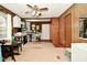 Playroom with brick wall, ceiling fan, and built-in storage at 6736 Carlsen Ave, Indianapolis, IN 46214