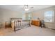 Bright bedroom with two windows and ample closet space at 6801 Bluffridge Ln, Indianapolis, IN 46278