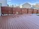 Spacious wooden deck with a wooden fence and rock landscaping at 8428 Gates Corner Dr, Camby, IN 46113