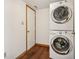 Laundry room with a stacked washer and dryer unit at 8613 Midsummer Dr, Indianapolis, IN 46239