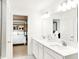 Double vanity bathroom with a view into the bedroom at 1831 Vista Ridge Dr, Greenwood, IN 46143