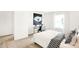 Spacious bedroom with large art and a workspace at 1831 Vista Ridge Dr, Greenwood, IN 46143