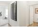 Clean hallway with modern art and bathroom access at 1831 Vista Ridge Dr, Greenwood, IN 46143