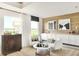 Bright sitting room with built-in cabinets and large windows offering scenic views at 1831 Vista Ridge Dr, Greenwood, IN 46143