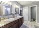 Main bathroom with double vanity, shower, and soaking tub at 2386 Blackberry Ct, Greenwood, IN 46143