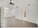 Main bedroom with hardwood floors, vaulted ceiling, and ensuite bathroom access at 1035 Helen Dr, Indianapolis, IN 46240