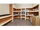 Finished basement with built-in shelving and ample storage at 11197 N Gasburg Rd, Mooresville, IN 46158