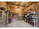 Barn storage area with shelving units, and various tools at 11197 N Gasburg Rd, Mooresville, IN 46158