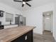 Renovated kitchen, featuring stainless steel appliances and an island at 1127 E Kelly St, Indianapolis, IN 46203