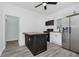 Modern kitchen with stainless steel appliances and a butcher block island at 1127 E Kelly St, Indianapolis, IN 46203