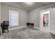 Bright bedroom featuring a window and built-in shelving at 133 N East St, Greenfield, IN 46140