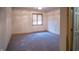 Simple bedroom with neutral walls and carpet flooring at 1865 Inisheer Ct, Indianapolis, IN 46217