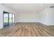 Spacious basement with sliding glass doors to patio at 202 Asbury Dr, Anderson, IN 46013