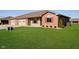 Brick ranch home with attached garage and landscaped lawn at 202 Asbury Dr, Anderson, IN 46013