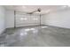 Spacious garage with high ceilings and an automatic door opener at 202 Asbury Dr, Anderson, IN 46013