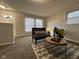 Living room with comfy seating, coffee table, and stylish rug at 2130 N Cherry St, Columbus, IN 47201