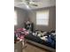 bedroom with a bed and various toys at 2307 N Catherwood Ave, Indianapolis, IN 46219