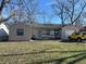Ranch home with attached garage and carport, spacious yard at 2307 N Catherwood Ave, Indianapolis, IN 46219
