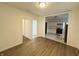 Open living room with hardwood floors, kitchen view at 2342 Hoyt Ave, Indianapolis, IN 46203