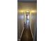 Long hallway with hardwood floors leading to other rooms at 240 S Marion St, Martinsville, IN 46151