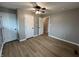 Well-lit bedroom with ceiling fan and double closets at 2732 Desoto Way, Columbus, IN 47203