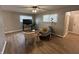 Bright living room with hardwood floors, comfy seating, and large TV at 2732 Desoto Way, Columbus, IN 47203