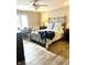Spacious bedroom with metal bed frame and hardwood floors at 316 Northpointe Ct, Danville, IN 46122