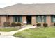 Brick ranch home with well-manicured lawn and walkway at 316 Northpointe Ct, Danville, IN 46122