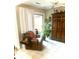 Relaxing living room featuring a leather chair and large window at 316 Northpointe Ct, Danville, IN 46122