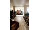 Living room with hardwood floors and view of dining area at 316 Northpointe Ct, Danville, IN 46122