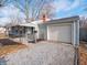 House exterior showcasing the garage and driveway at 3931 N Faculty Dr, Indianapolis, IN 46254