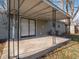 Concrete patio with metal railings and sliding glass doors at 3931 N Faculty Dr, Indianapolis, IN 46254