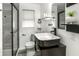 Modern bathroom with floating vanity and black accents at 4110 E Michigan St, Indianapolis, IN 46201