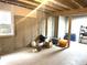 Unfinished basement with concrete walls and large window at 4655 Winterstill Rd, Zionsville, IN 46077