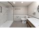 Basement bathroom with marble shower and modern fixtures at 5493 E 18Th St, Indianapolis, IN 46218